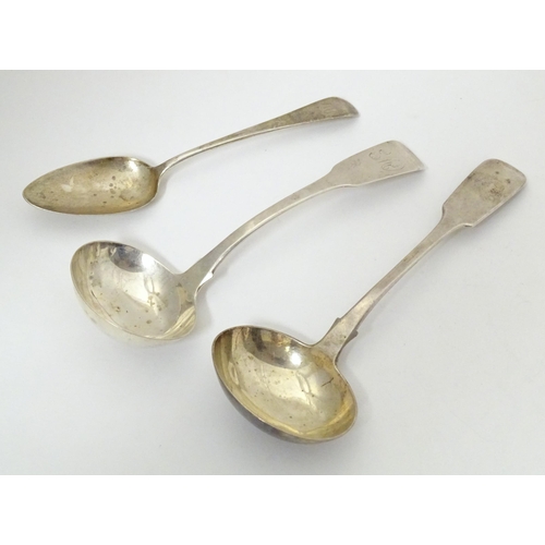 301 - Two silver fiddle pattern sauce ladles, together with an Old English pattern dessert spoon. The ladl... 