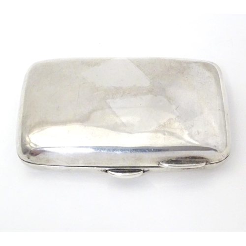 303 - A silver cigarette case with gilded interior, hallmarked Birmingham 1904, maker Smith & Bartlam. App... 