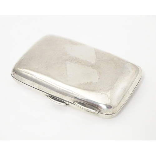 303 - A silver cigarette case with gilded interior, hallmarked Birmingham 1904, maker Smith & Bartlam. App... 