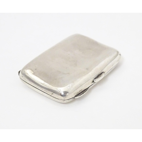 303 - A silver cigarette case with gilded interior, hallmarked Birmingham 1904, maker Smith & Bartlam. App... 