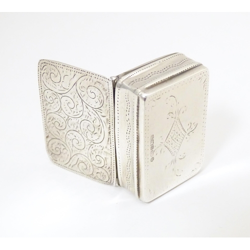 305 - A silver pill box with engraved decoration, hallmarked Sheffield 2002, maker Carrs of Sheffield Ltd.... 