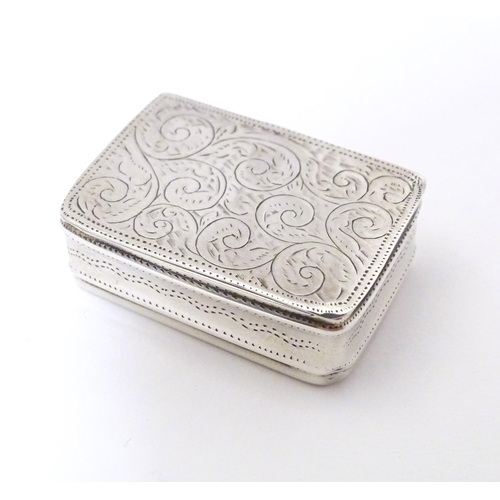 305 - A silver pill box with engraved decoration, hallmarked Sheffield 2002, maker Carrs of Sheffield Ltd.... 