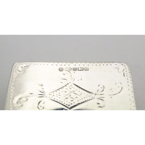 305 - A silver pill box with engraved decoration, hallmarked Sheffield 2002, maker Carrs of Sheffield Ltd.... 