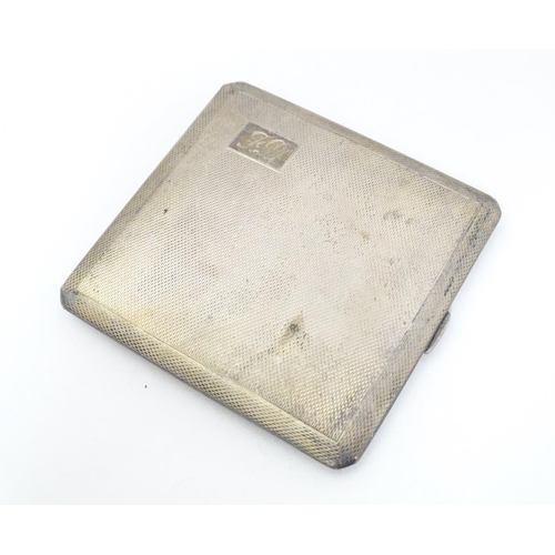 309 - A silver cigarette case with engine turned decoration and gilded interior, hallmarked Birmingham 196... 