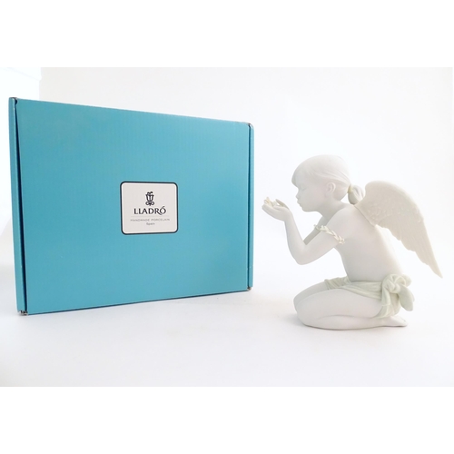 113 - A Lladro figure modelled as an angel, A Fantasy Breath, model no. 9223. Marked under. With original ... 