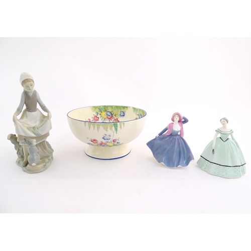 123 - Assorted ceramics to include a Lladro lady, Rabbit's Food, model no. 4826, two Coalport ladies, one ... 