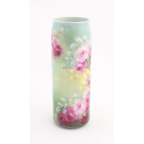 128 - A Lenox Belleek cylindrical vase with floral rose decoration. Marked under. Approx. 11