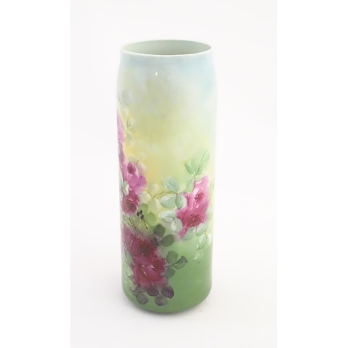 128 - A Lenox Belleek cylindrical vase with floral rose decoration. Marked under. Approx. 11