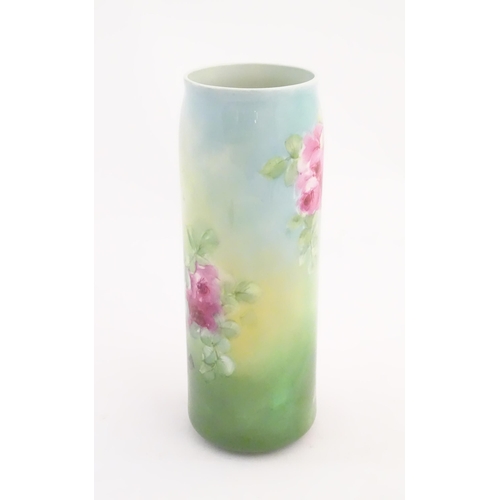 128 - A Lenox Belleek cylindrical vase with floral rose decoration. Marked under. Approx. 11