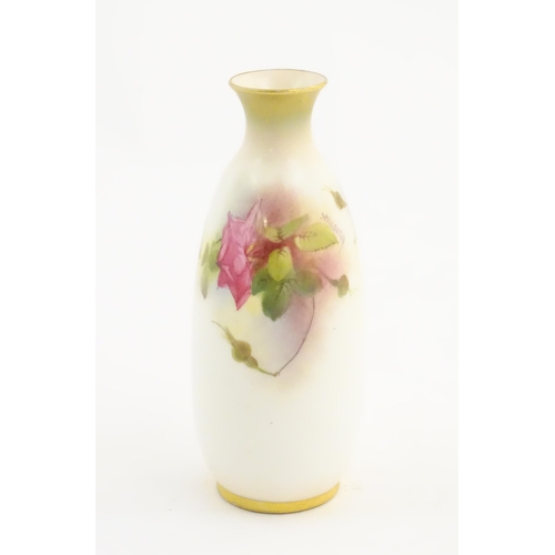 129 - A Royal Worcester vase with floral decoration. Signed Ethel Spilsbury. Marked under. Approx. 5 1/4