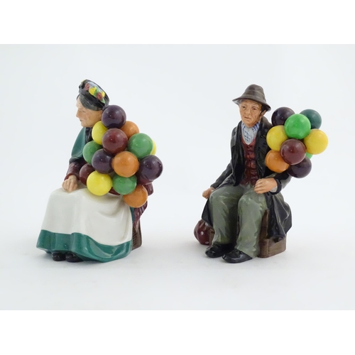 133 - Two Royal Doulton figures modelled as balloon sellers, HN1315 and HN1954. Marked under. Approx. 7 1/... 