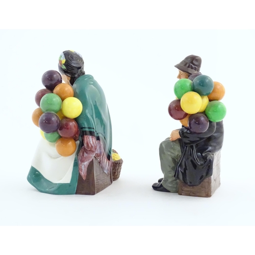 133 - Two Royal Doulton figures modelled as balloon sellers, HN1315 and HN1954. Marked under. Approx. 7 1/... 