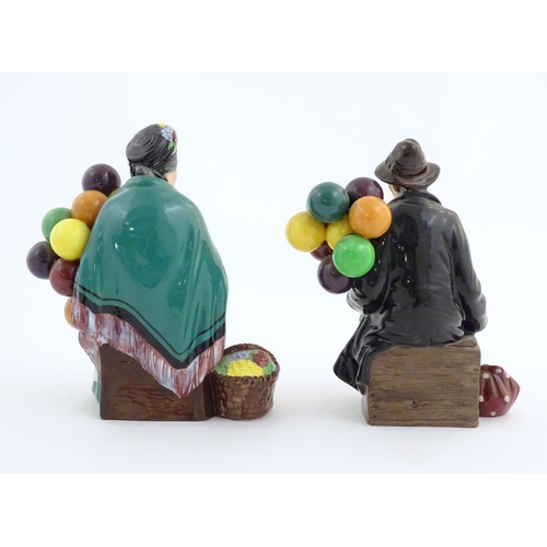 133 - Two Royal Doulton figures modelled as balloon sellers, HN1315 and HN1954. Marked under. Approx. 7 1/... 