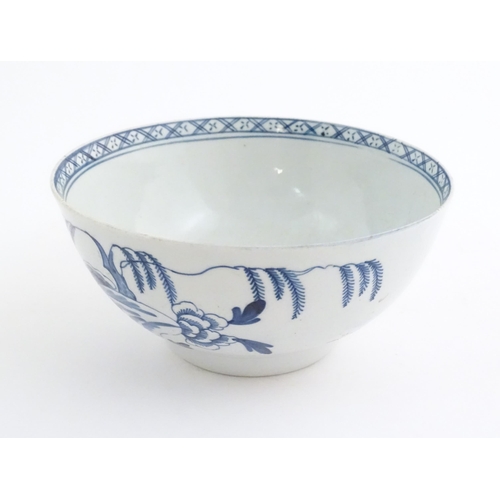 66 - A Chaffers (Liverpool) blue and white bowl decorated with peony flower, willow tree and rocky detail... 