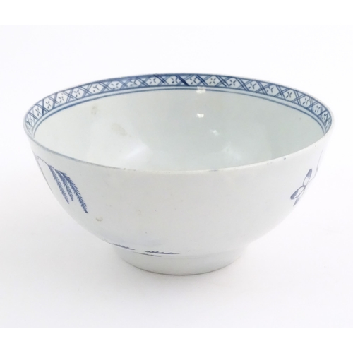 66 - A Chaffers (Liverpool) blue and white bowl decorated with peony flower, willow tree and rocky detail... 