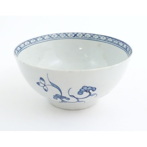 66 - A Chaffers (Liverpool) blue and white bowl decorated with peony flower, willow tree and rocky detail... 