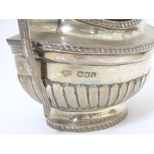 316 - A silver sugar bowl and cream jug hallmarked London 1905, maker Goldsmiths & Silversmiths Company Lt... 