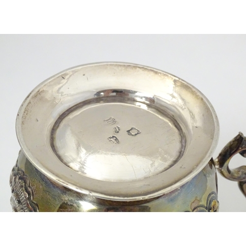 328 - A Geo II silver mug hallmarked London 1748  London 1748. Approx. 4 1/2