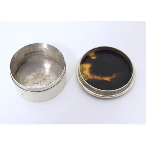 329 - A silver and tortoiseshell pill box with  pique decoration to lid. Hallmarked  London 1912 Approx. 1... 