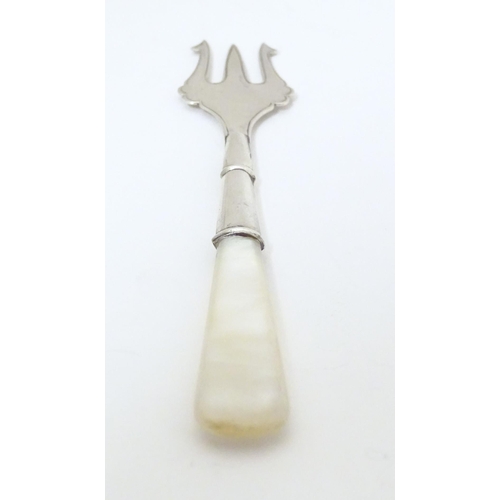 330 - A silver pickle fork with a mother of pearl handle, hallmarked Birmingham 1921, maker William Adams ... 