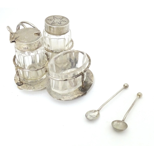 333 - A silver cruet stand with salt, mustard and pepper, hallmarked London 1904, maker Hukin & Heath