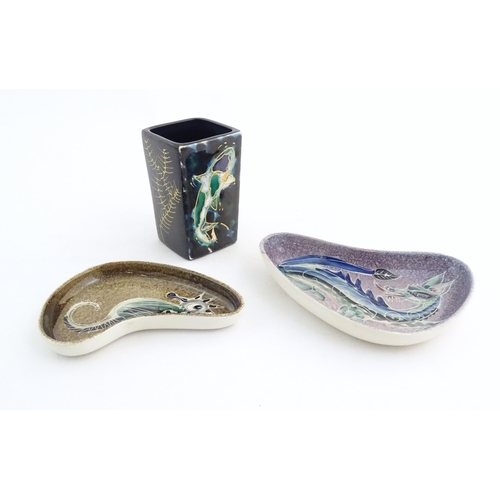 165 - Two studio pottery shaped dishes by Jo Lester, one with seahorse decoration, the other with dragon d... 