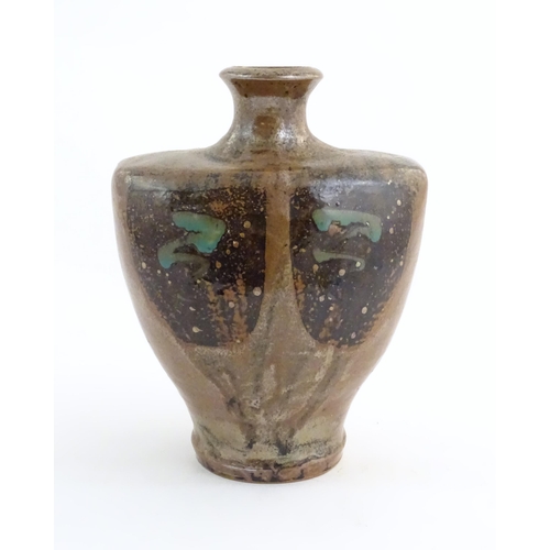 167 - A studio pottery vase by John Bedding (b. 1947). Monogram to rim of base. Approx. 10 3/4