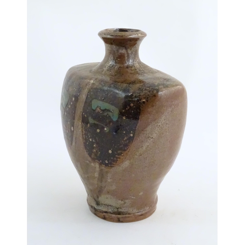 167 - A studio pottery vase by John Bedding (b. 1947). Monogram to rim of base. Approx. 10 3/4