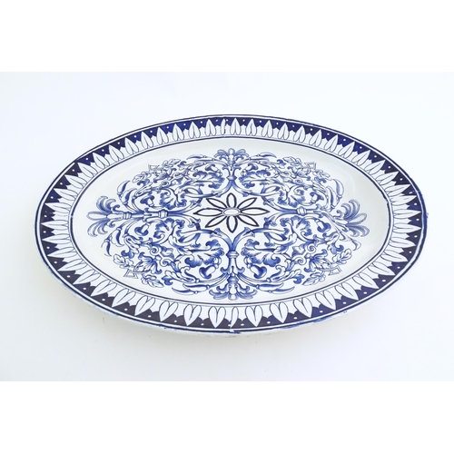 173 - A blue and white meat plate in the pattern Teutonic by Brown Westhead Moore. Marked under BWM & Co. ... 