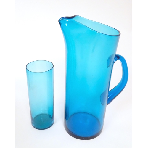 221 - A retro kingfisher turquoise blue coloured glass lemonade set comprising jug and 12 glasses. In the ... 