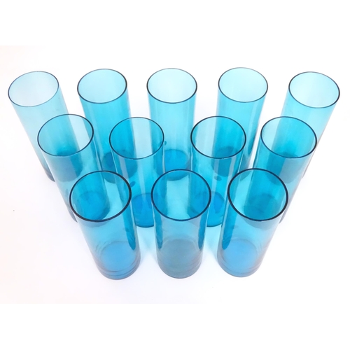 221 - A retro kingfisher turquoise blue coloured glass lemonade set comprising jug and 12 glasses. In the ... 