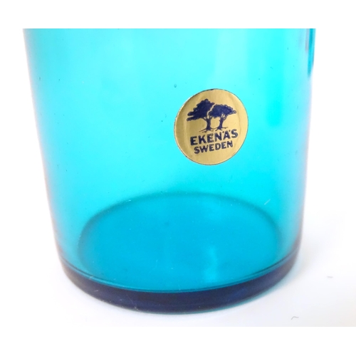 221 - A retro kingfisher turquoise blue coloured glass lemonade set comprising jug and 12 glasses. In the ... 