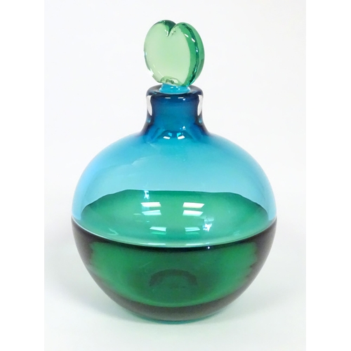 230 - A studio glass scent / perfume bottle in the manner of Mike Hunter. Indistinctly signed under. 5 1/2... 