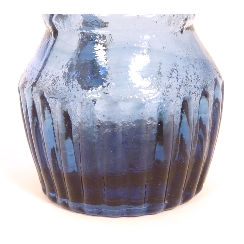 231 - A blue glass cream jug with loop handle. North East England c.1830. 4