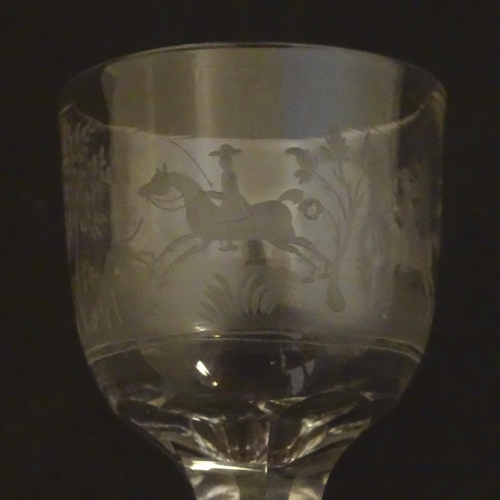 234 - two 19thC glass drinking glasses one with etched hunting scenes. The tallest 6 1/2