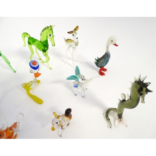 247 - A quantity of assorted glass animals modelled as horses, fish, birds, cat etc (approx. 15)