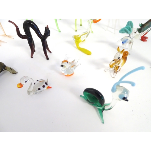 247 - A quantity of assorted glass animals modelled as horses, fish, birds, cat etc (approx. 15)