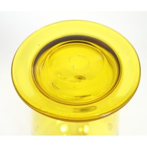 252 - A Victorian yellow glass jug with punt decoration. Approx 10 1/4