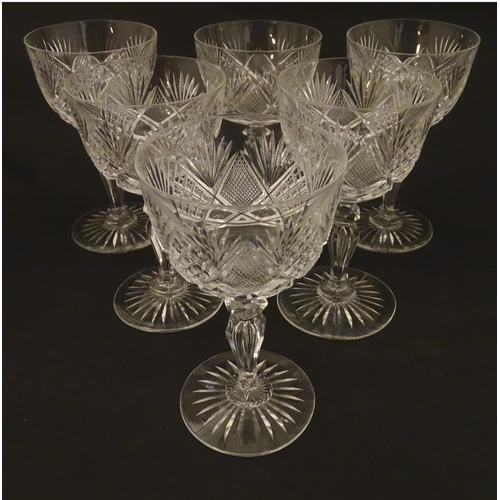 264 - Six 20thC pedestal wine glasses with cut decoration. Approx. 6