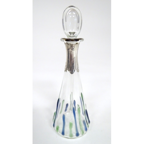 271 - A Sileda glass scent / perfume bottle with silver collar hallmarked London 1988. Approx 5 3/4