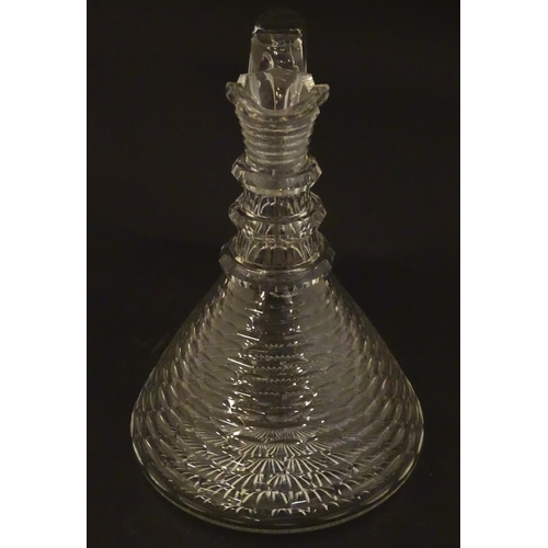 276 - A 19thC cut glass claret jug with facet cut detail and loop handle. 9