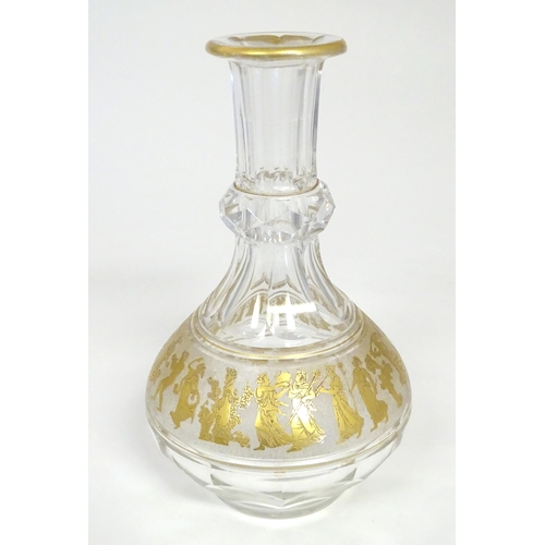 279 - An early 20thC glass decanter with banded gilt detail depicting classical figures. Probably by Moser... 