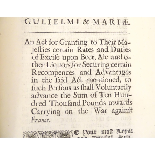 937 - A large quantity of 17thC William and Mary Acts of Parliament, to include An act for the more effect... 