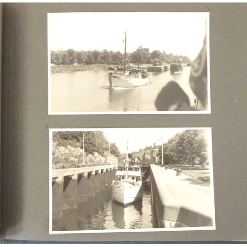 952 - Two 20thC photograph albums, one documenting a trip to Sweden 1944 to include Stockholm city hall, v... 