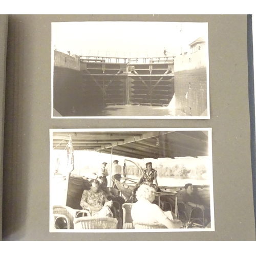 952 - Two 20thC photograph albums, one documenting a trip to Sweden 1944 to include Stockholm city hall, v... 