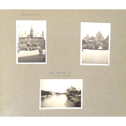 952 - Two 20thC photograph albums, one documenting a trip to Sweden 1944 to include Stockholm city hall, v... 