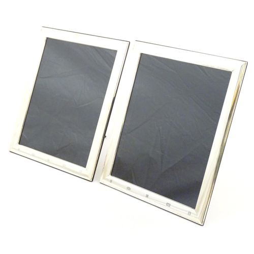 414 - Two easel back photograph frames with silver surrounds hallmarked Sheffield 2017, maker Carrs of She... 