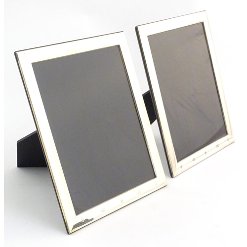 414 - Two easel back photograph frames with silver surrounds hallmarked Sheffield 2017, maker Carrs of She... 