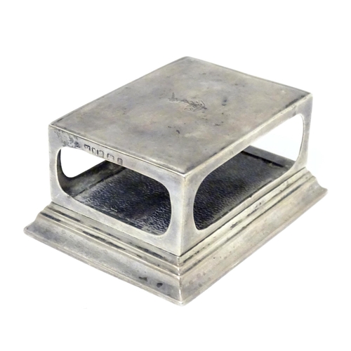 447A - A silver match box case / table top stand hallmarked Birmingham 1902, maker Henry Matthews. Approx. ... 