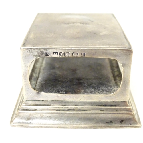 447A - A silver match box case / table top stand hallmarked Birmingham 1902, maker Henry Matthews. Approx. ... 